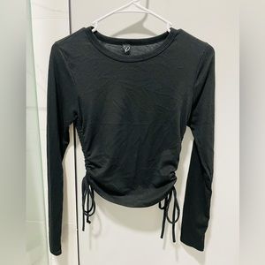 Black long sleeve Windsor top with adjustable sides